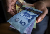 Canadians are being more cautious and selective with their money: report