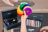 These tiny records now have their own miniature record player
