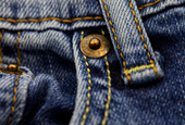 Through much of the American experience, blue jeans have been a common thread