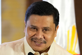 Philippine senator charged with plunder says he will surrender