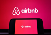 Airbnb boosts annual sales outlook while spending picks up