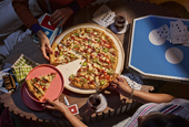 Domino's launches Spicy Chicken Bacon Ranch Pizza, partners with Retta for $9.99 deal