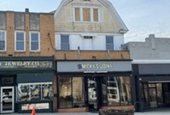 Small business owner buys fire-damaged storefronts at auction